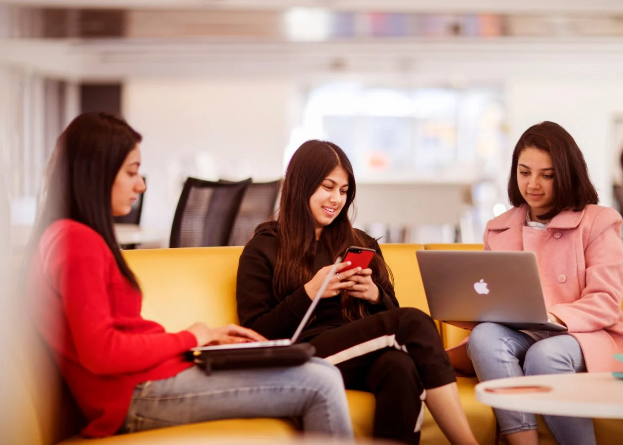 students talking on campus